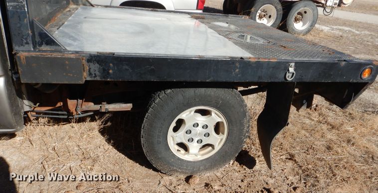 image for item DJ4918 2003 Chevrolet Silverado 1500  Ext. Cab flatbed pickup truck