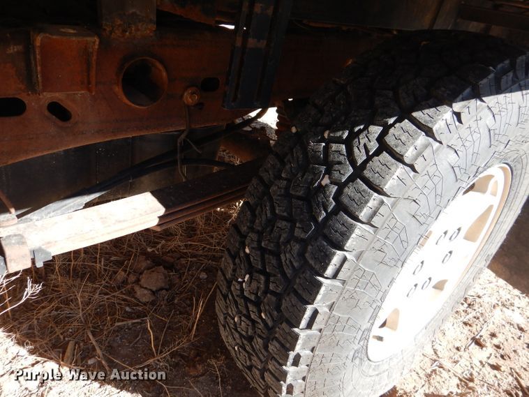 image for item DJ4918 2003 Chevrolet Silverado 1500  Ext. Cab flatbed pickup truck