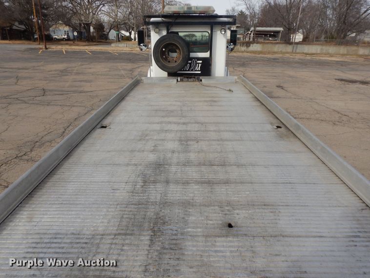 image for item DL2741 2003 Kenworth T300  rollback truck