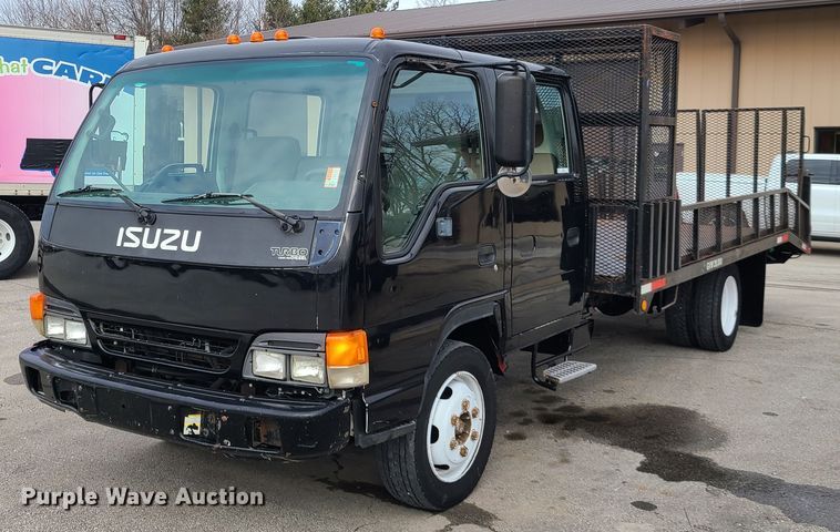 image for item IA9284 2005 Isuzu NQR  CrewCab flatbed truck