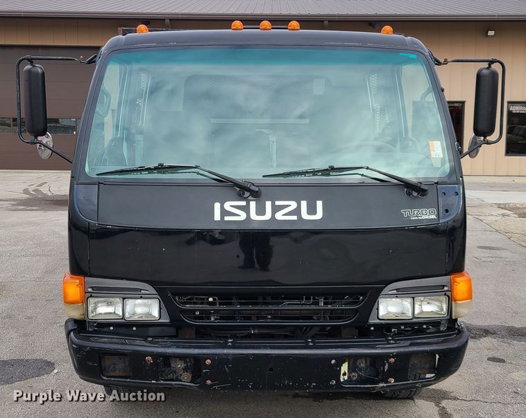 image for item IA9284 2005 Isuzu NQR  CrewCab flatbed truck
