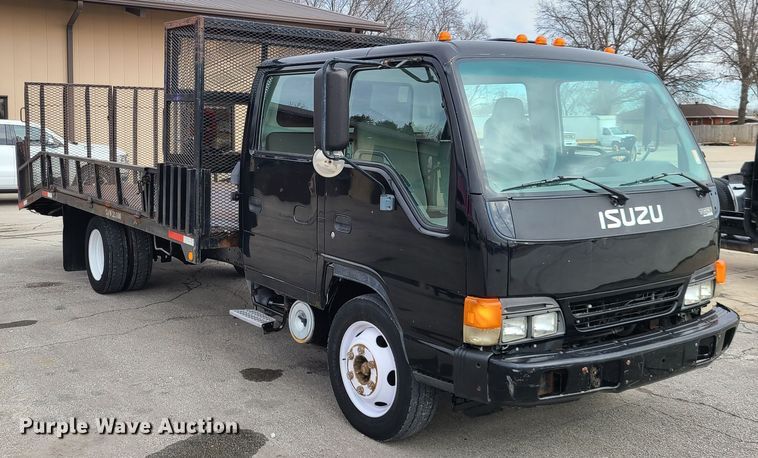 image for item IA9284 2005 Isuzu NQR  CrewCab flatbed truck