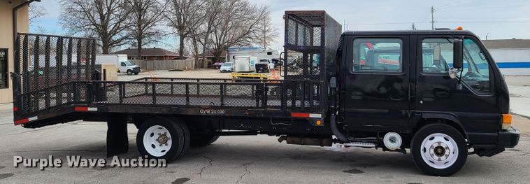 image for item IA9284 2005 Isuzu NQR  CrewCab flatbed truck