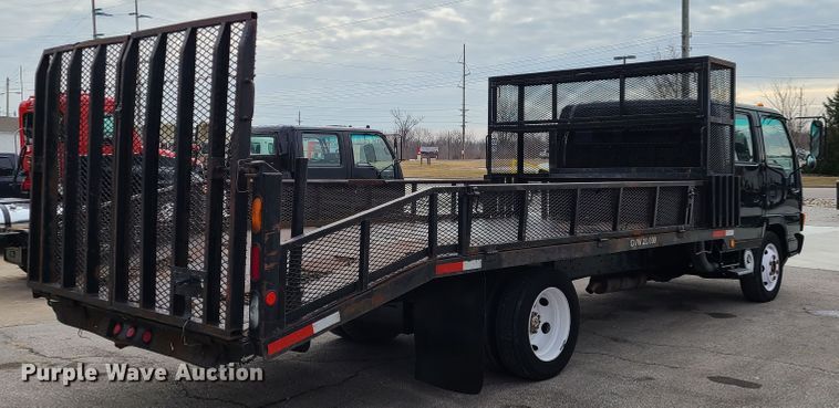 image for item IA9284 2005 Isuzu NQR  CrewCab flatbed truck