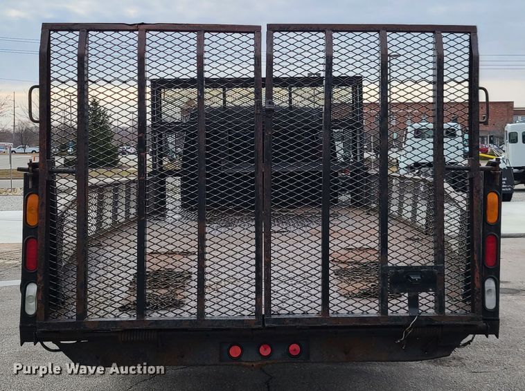 image for item IA9284 2005 Isuzu NQR  CrewCab flatbed truck