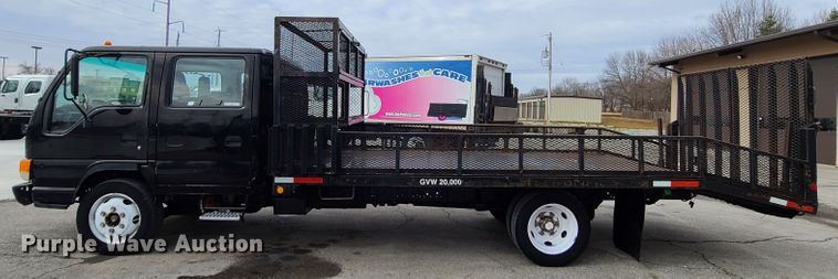 image for item IA9284 2005 Isuzu NQR  CrewCab flatbed truck