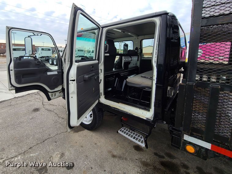 image for item IA9284 2005 Isuzu NQR  CrewCab flatbed truck