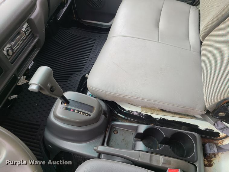 image for item IA9284 2005 Isuzu NQR  CrewCab flatbed truck