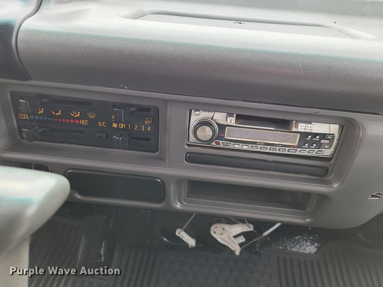 image for item IA9284 2005 Isuzu NQR  CrewCab flatbed truck