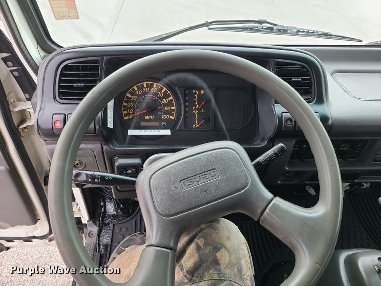 image for item IA9284 2005 Isuzu NQR  CrewCab flatbed truck