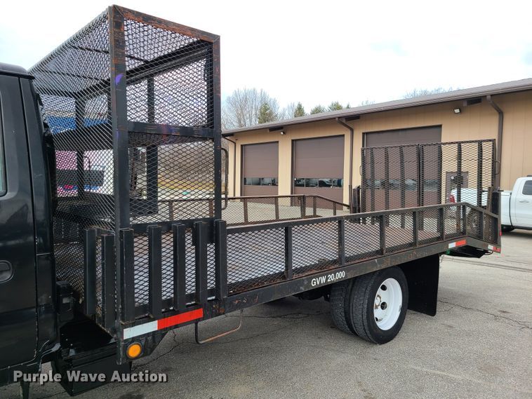 image for item IA9284 2005 Isuzu NQR  CrewCab flatbed truck