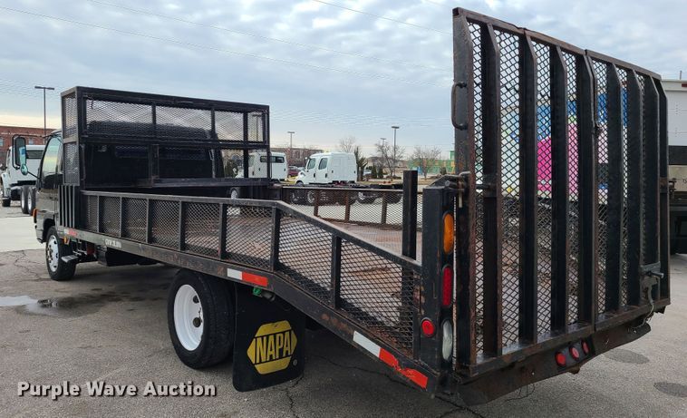 image for item IA9284 2005 Isuzu NQR  CrewCab flatbed truck