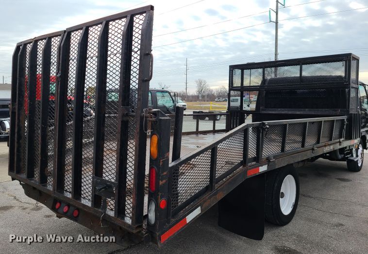 image for item IA9284 2005 Isuzu NQR  CrewCab flatbed truck