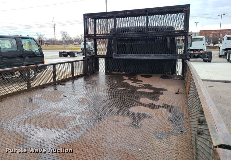 image for item IA9284 2005 Isuzu NQR  CrewCab flatbed truck