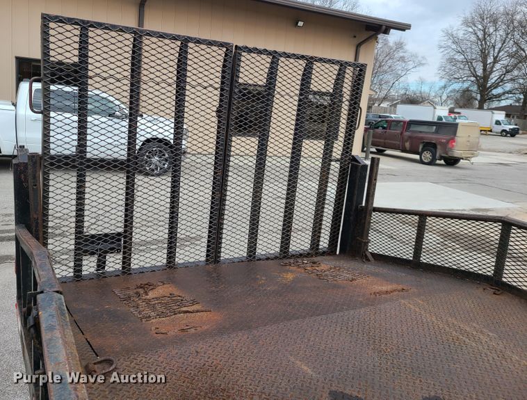 image for item IA9284 2005 Isuzu NQR  CrewCab flatbed truck