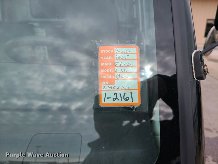 image for item IA9284 2005 Isuzu NQR  CrewCab flatbed truck