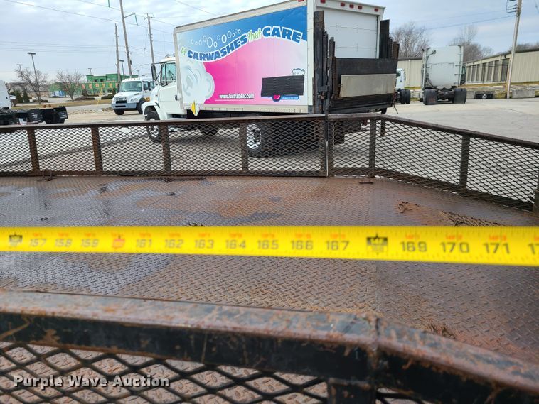 image for item IA9284 2005 Isuzu NQR  CrewCab flatbed truck