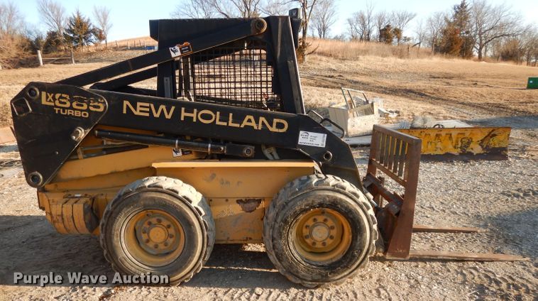 image for item DL2104 1998 New Holland LX885  skid steer loader