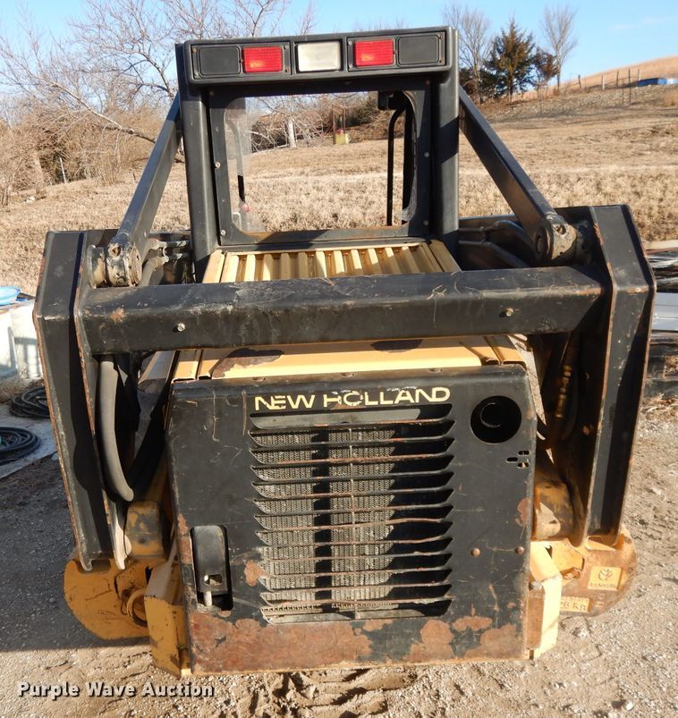 image for item DL2104 1998 New Holland LX885  skid steer loader