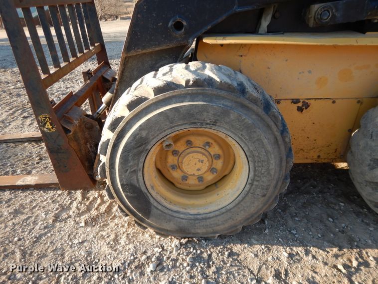 image for item DL2104 1998 New Holland LX885  skid steer loader