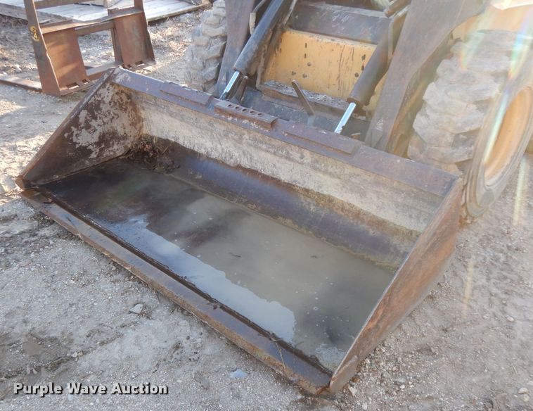 image for item DL2104 1998 New Holland LX885  skid steer loader