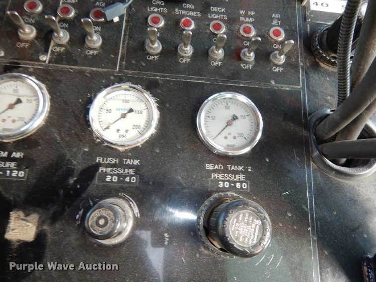 image for item DJ2879 2005 Peterbilt 320  paint striping truck