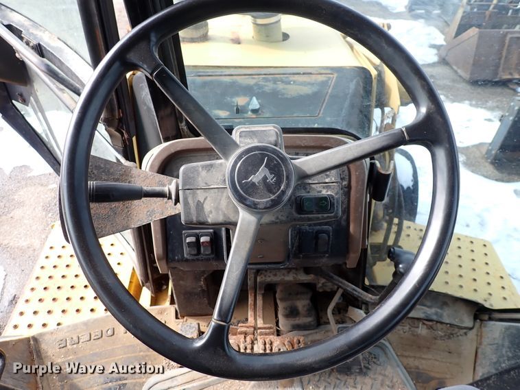 image for item DK4512 1997 John Deere 310E  backhoe