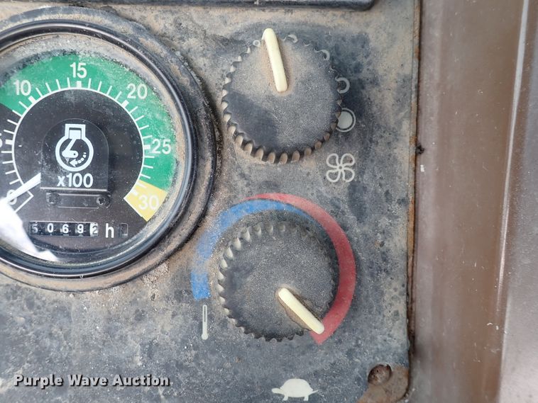 image for item DK4512 1997 John Deere 310E  backhoe