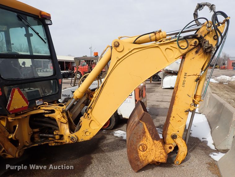image for item DK4512 1997 John Deere 310E  backhoe