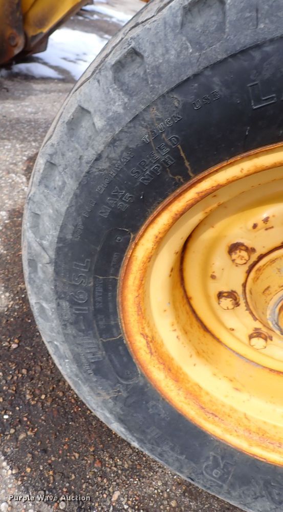 image for item DK4512 1997 John Deere 310E  backhoe