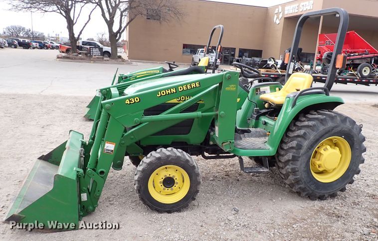 image for item DJ0061 2001 John Deere 4400  MFWD tractor