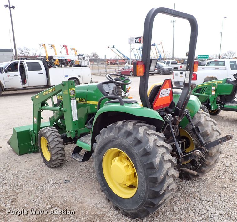 image for item DJ0061 2001 John Deere 4400  MFWD tractor