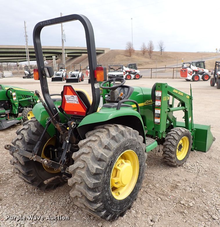 image for item DJ0061 2001 John Deere 4400  MFWD tractor