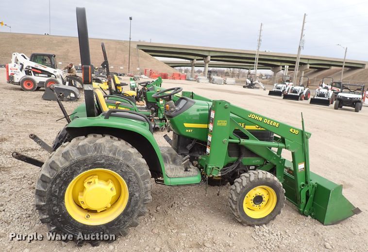 image for item DJ0061 2001 John Deere 4400  MFWD tractor