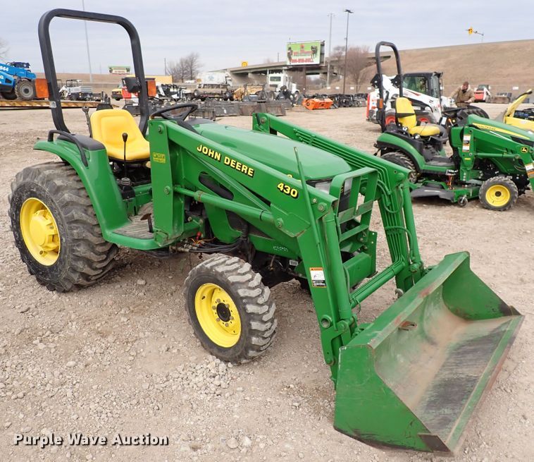 image for item DJ0061 2001 John Deere 4400  MFWD tractor