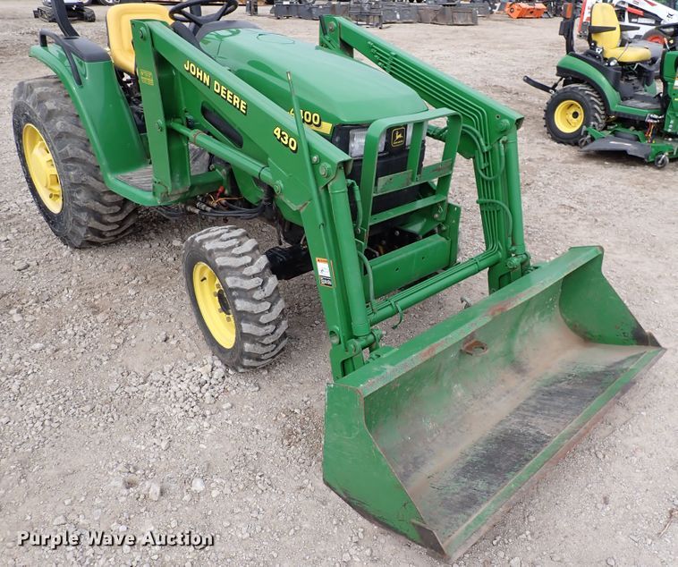 image for item DJ0061 2001 John Deere 4400  MFWD tractor