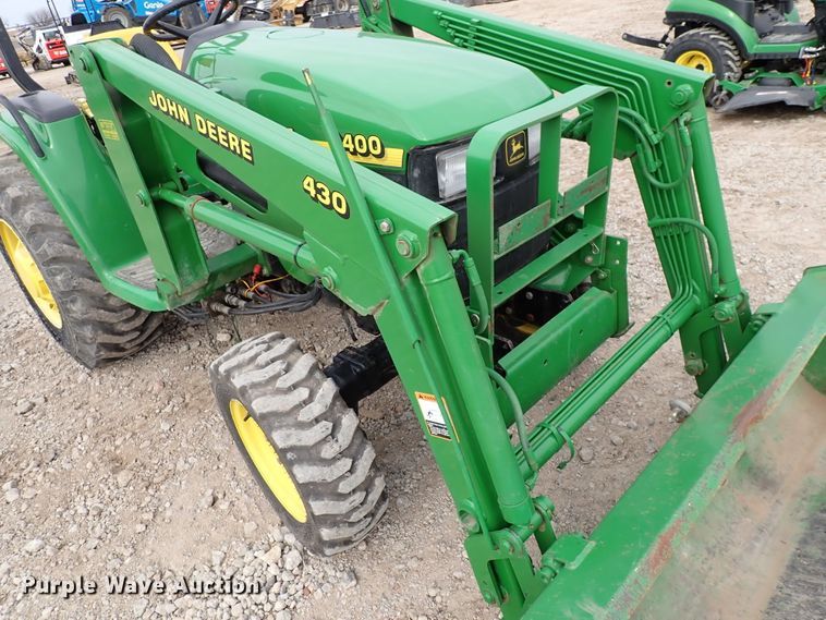 image for item DJ0061 2001 John Deere 4400  MFWD tractor