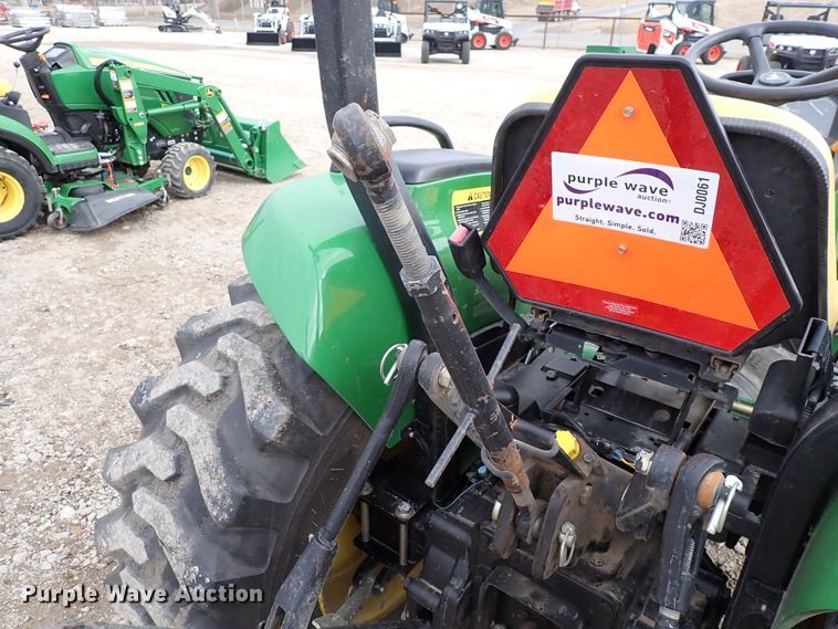 image for item DJ0061 2001 John Deere 4400  MFWD tractor