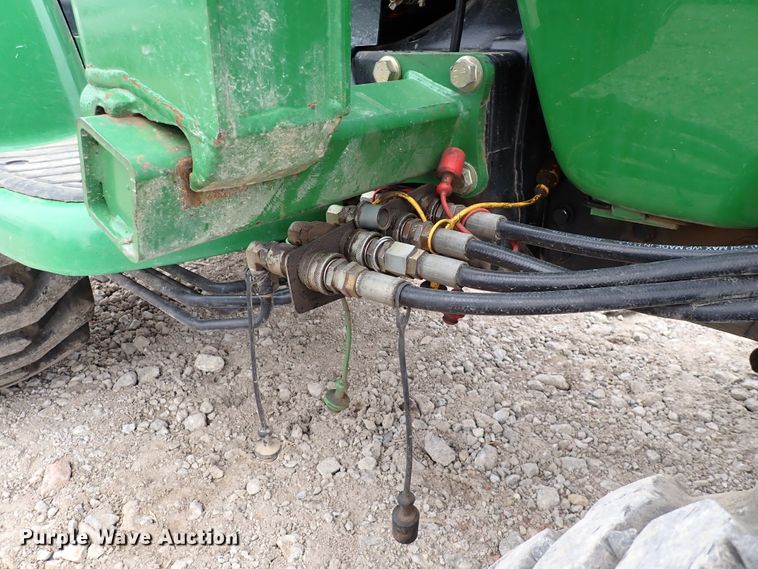 image for item DJ0061 2001 John Deere 4400  MFWD tractor