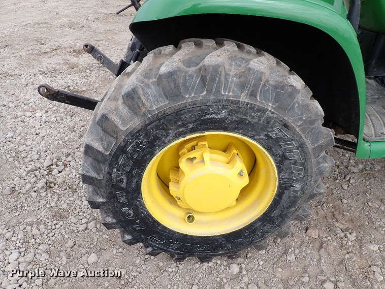 image for item DJ0061 2001 John Deere 4400  MFWD tractor