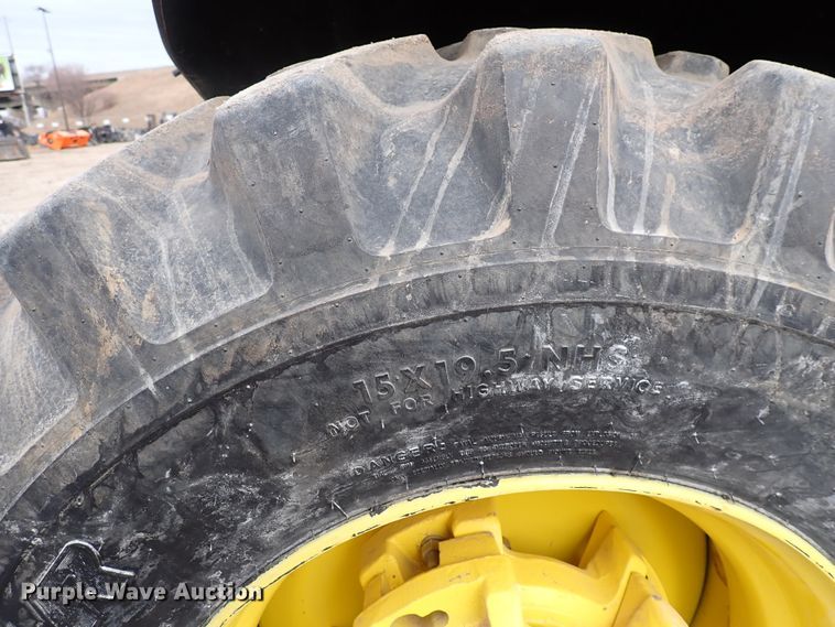 image for item DJ0061 2001 John Deere 4400  MFWD tractor