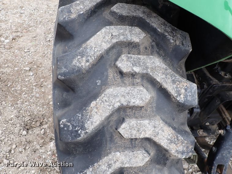 image for item DJ0061 2001 John Deere 4400  MFWD tractor