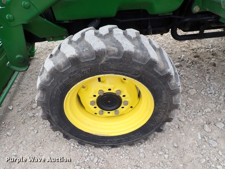 image for item DJ0061 2001 John Deere 4400  MFWD tractor