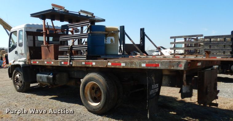 image for item DM2811 1999 GMC Isuzu FTR  flatbed truck