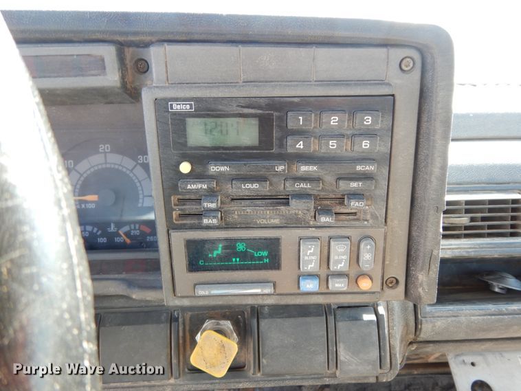 image for item DM2819 2000 GMC 7500  flatbed truck