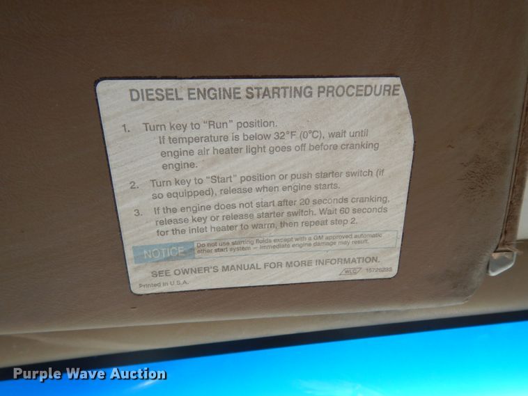 image for item DM2819 2000 GMC 7500  flatbed truck