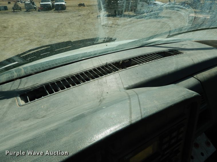 image for item DM2819 2000 GMC 7500  flatbed truck