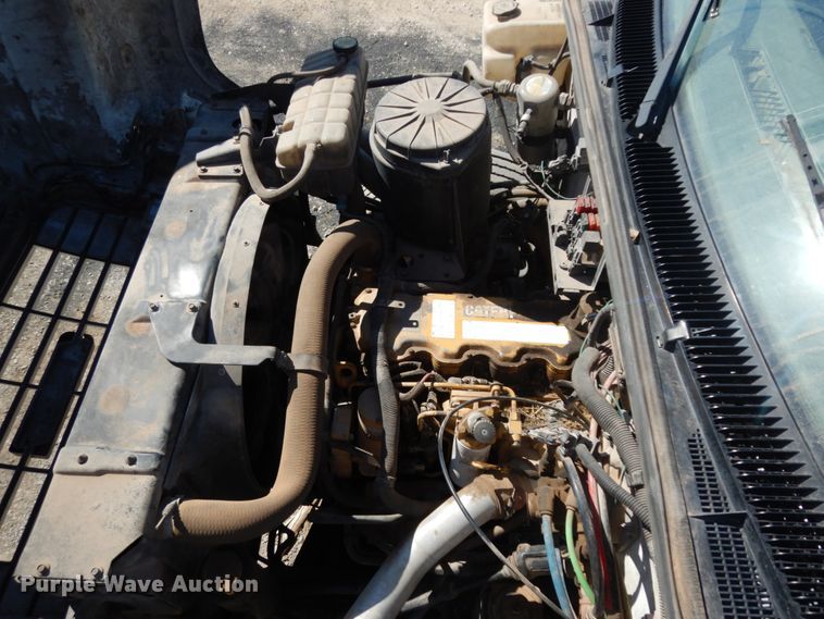 image for item DM2819 2000 GMC 7500  flatbed truck