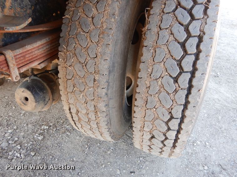 image for item DM2819 2000 GMC 7500  flatbed truck