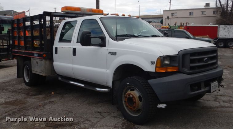 image for item GT9577 1999 Ford F550 Super Duty  Crew Cab flatbed pickup truck